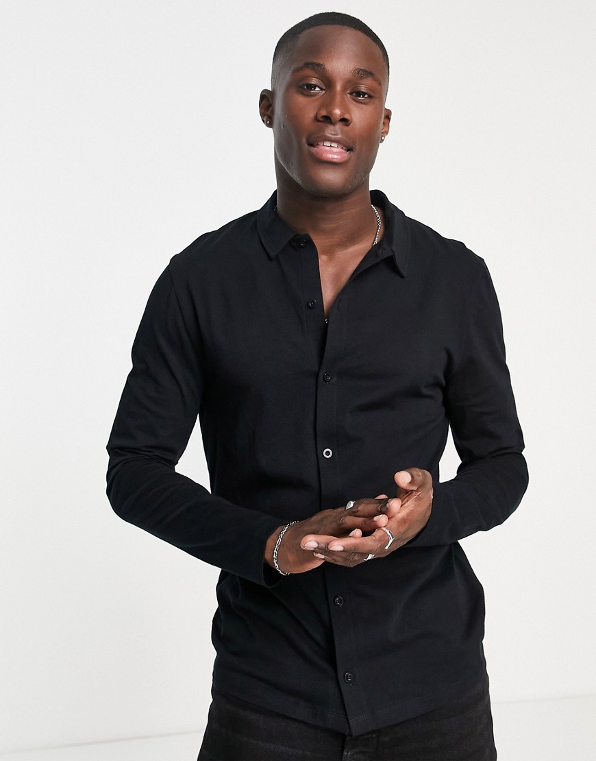 Chemise moulante en jersey à manches longues en tissu biologique